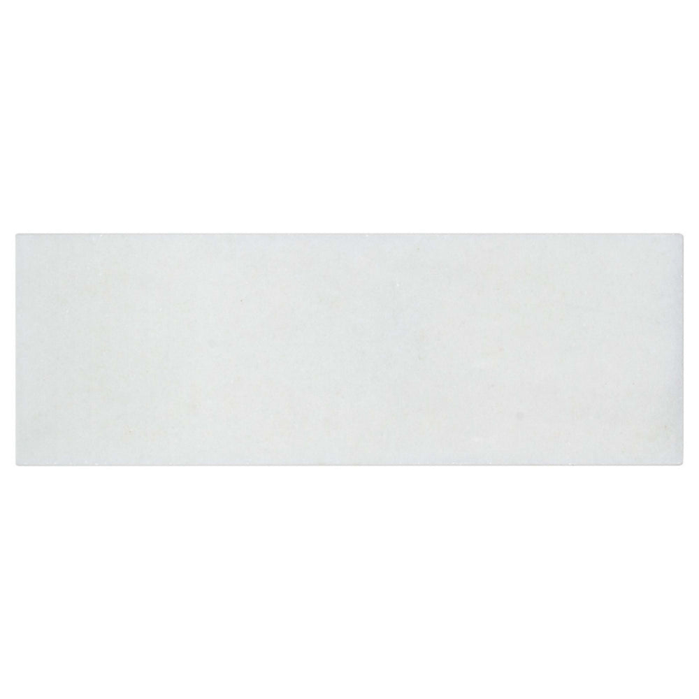 The Finish Line in Regency White 3x9 Natural Stone